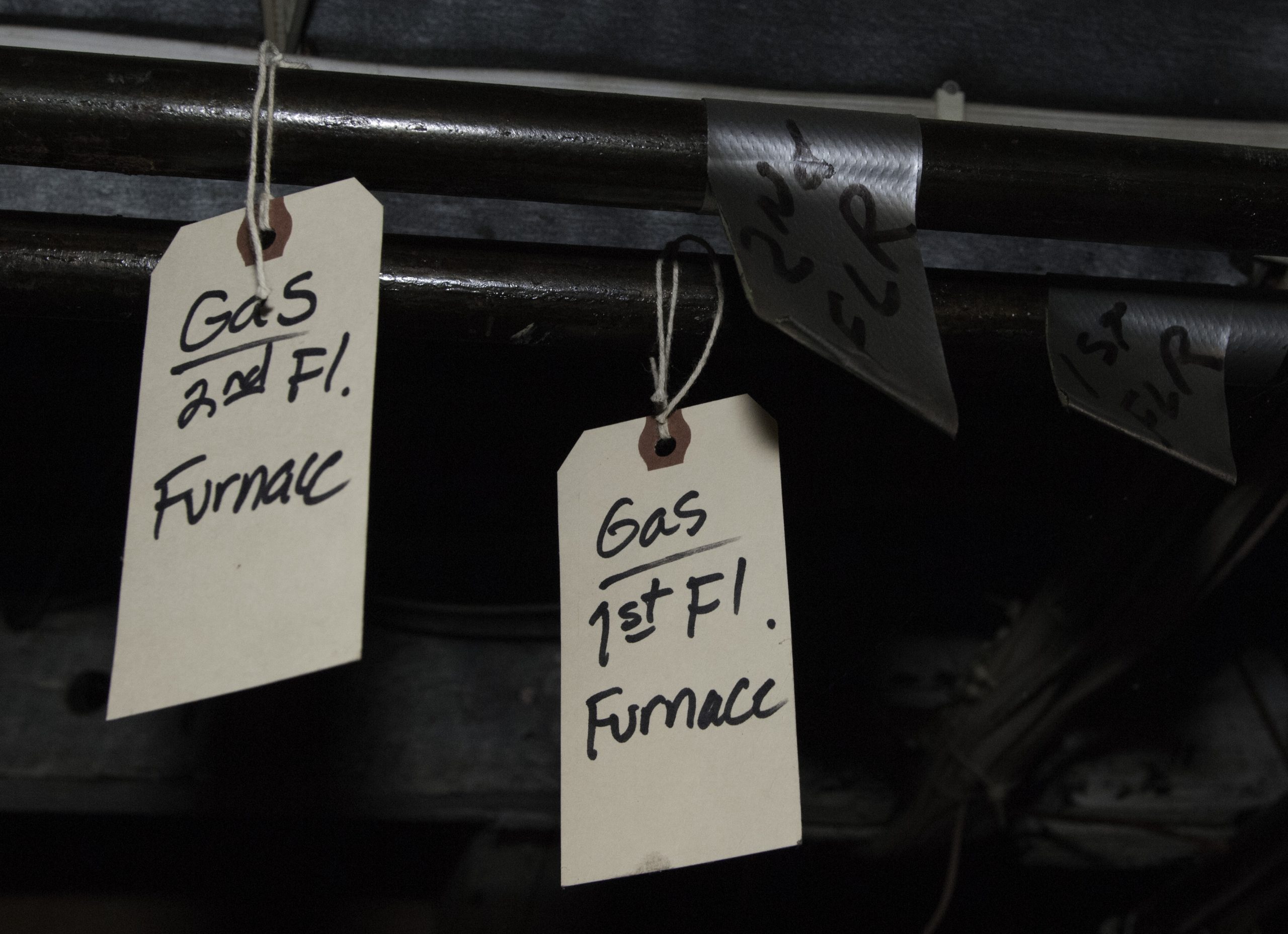 Tags on gas furnace pipes