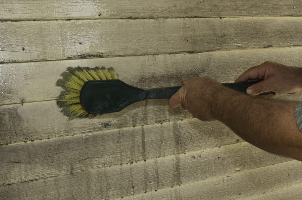Washing siding to prepare for paing